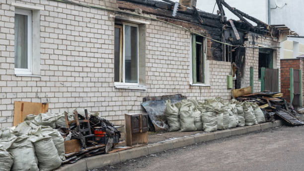 Professional Fire Damage Restoration technician working in Clayton, WI